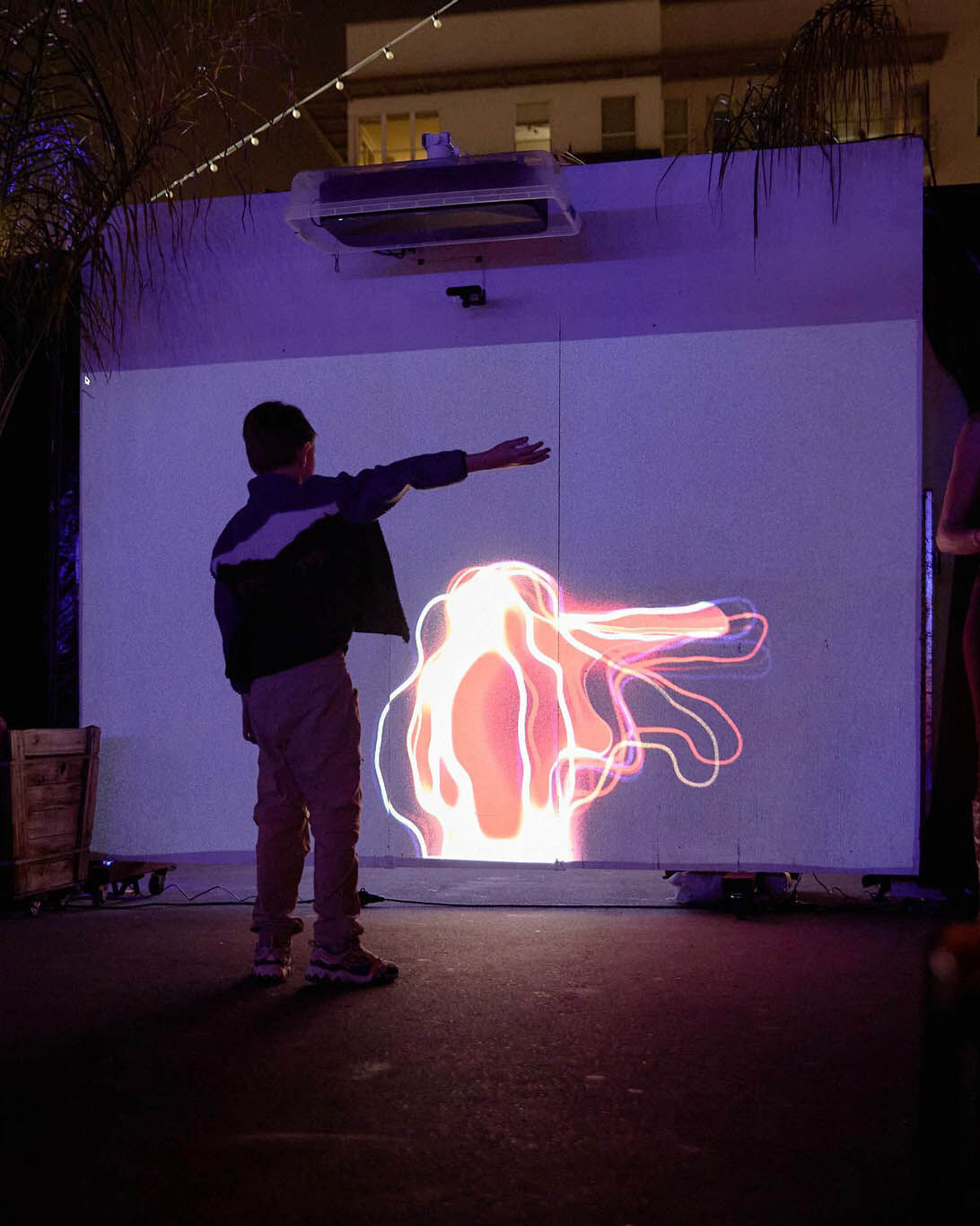 Time Shadows mode — visitor silhouettes creating light trails